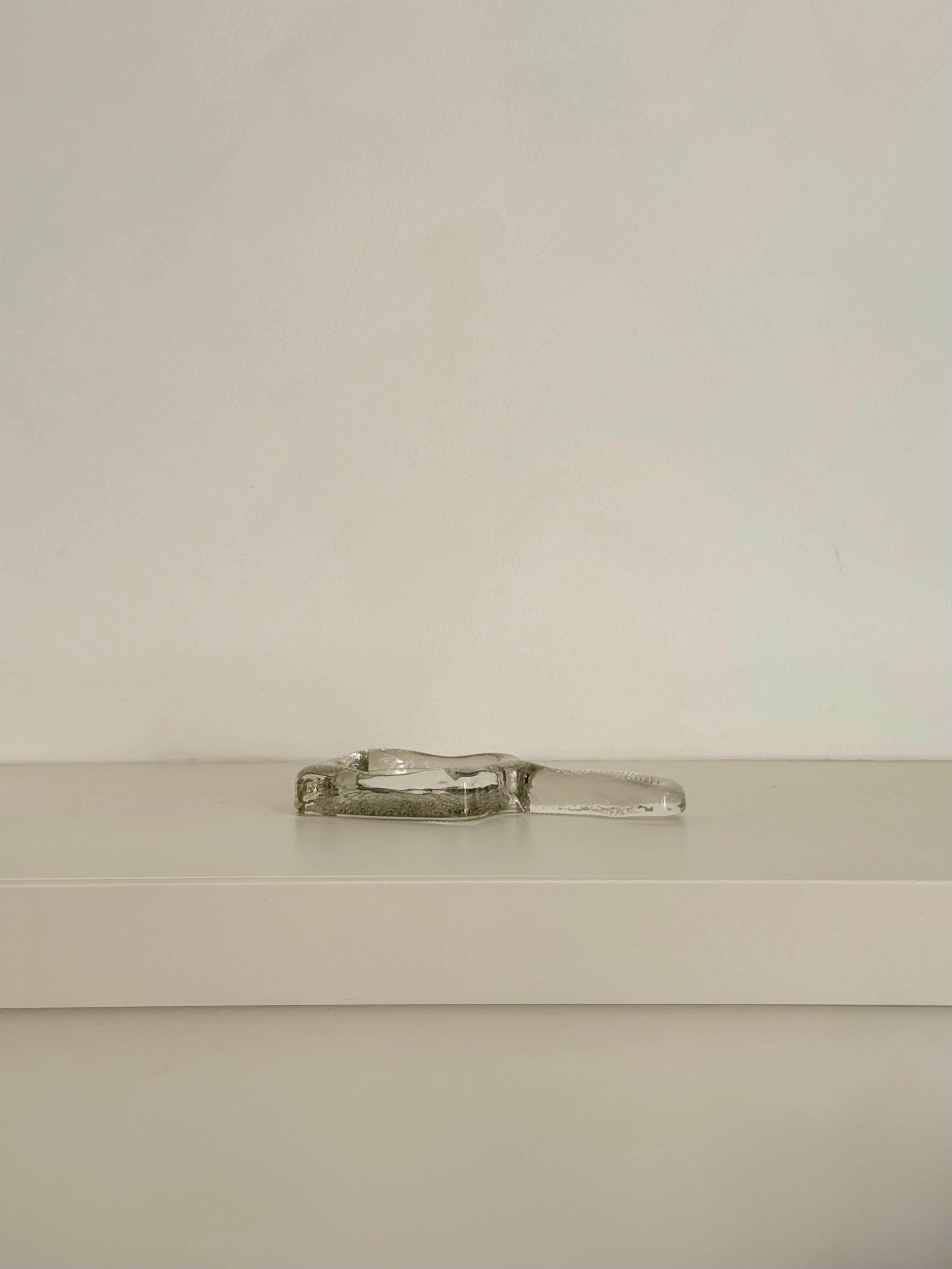 hand mirror in glass