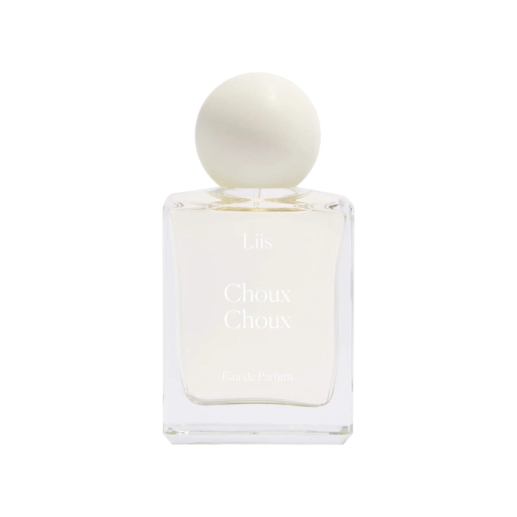 Liis Choux Choux Eau de Parfum in a clear glass bottle with a round cream-white spherical cap