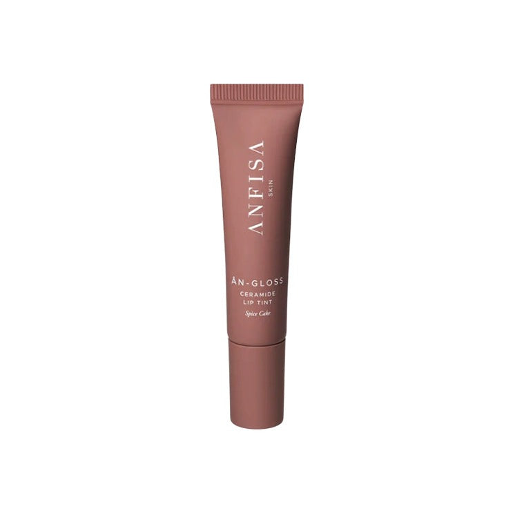 Anfisa Ân-Gloss Ceramide Lip Tint in Spice Cake, a warm mauve-nude squeeze tube