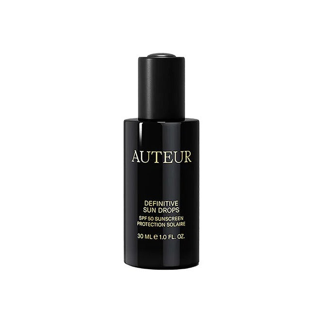 Auteur Definitive Sun Drops SPF 50 sunscreen in a 30 ml black dropper bottle