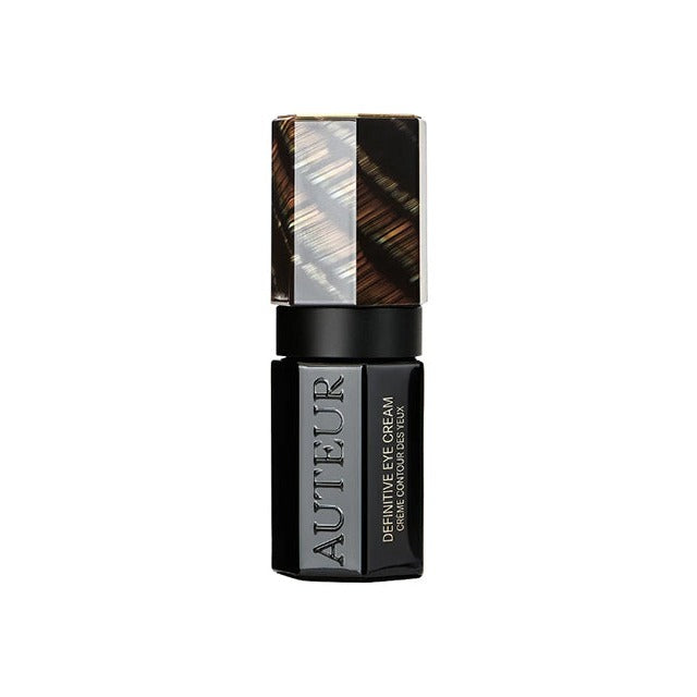 Auteur Definitive Eye Cream in a compact black jar with iridescent tortoiseshell cap