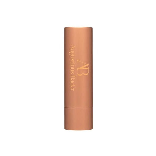Augustinus Bader The Lip Balm in a rose-gold cylindrical tube