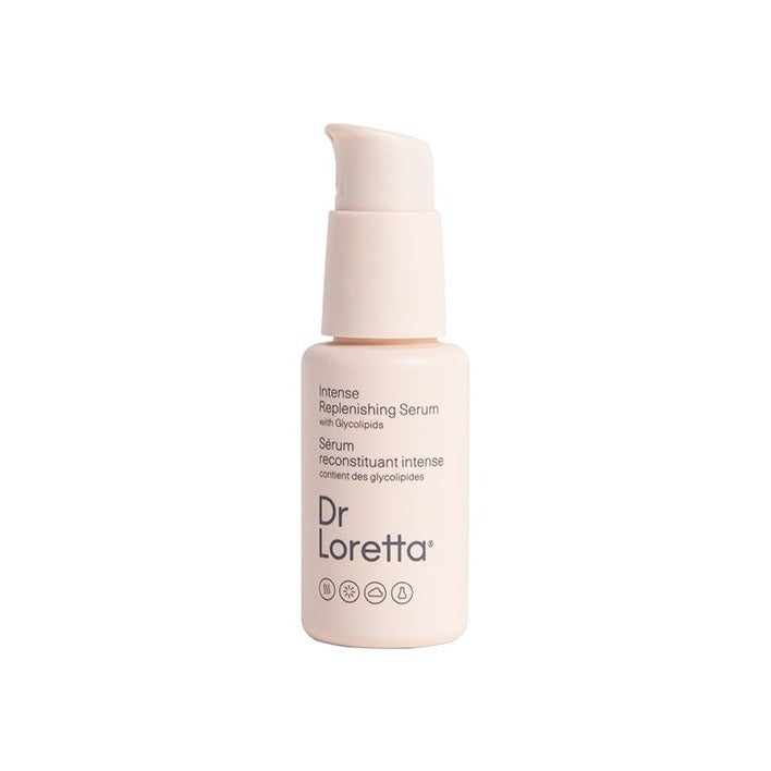 Dr. Loretta Intense Replenishing Serum in a small blush-pink pump bottle