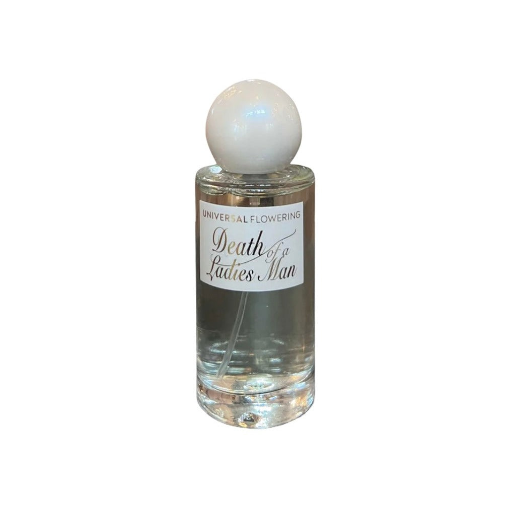 Universal Flowering Death of a Ladies Man eau de parfum in a clear glass bottle with a white sphere cap