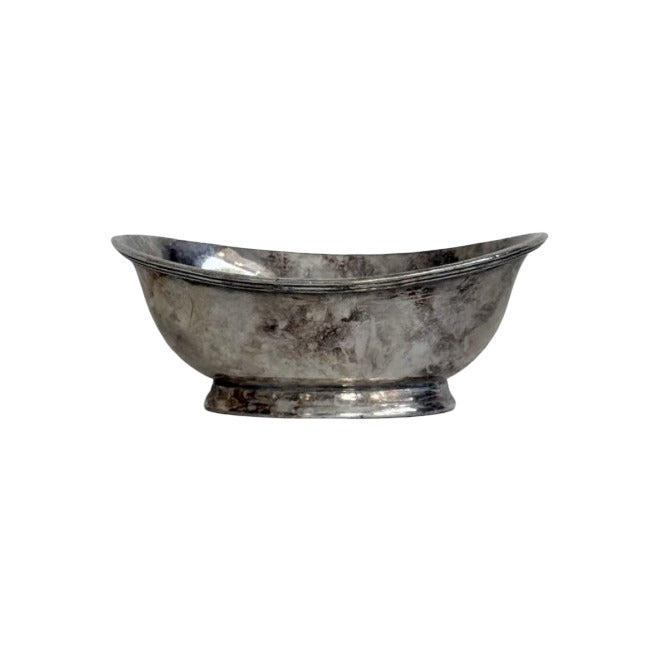 Antiqued silver oblong bowl with footed base and patinated finish
