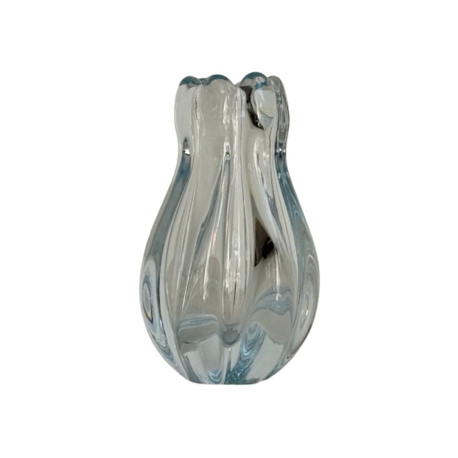 Light blue art glass vase by Vicke Lindstrand with a ribbed, petal-shaped silhouette and swirling blue tones