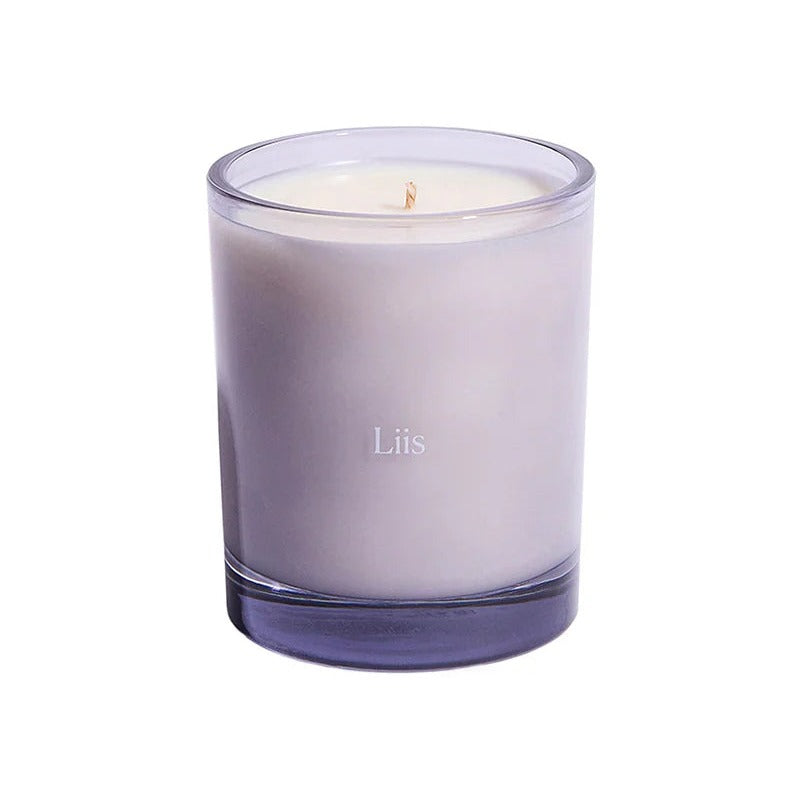 Liis Temper Affectionate scented candle in a soft lavender glass vessel with a single wick