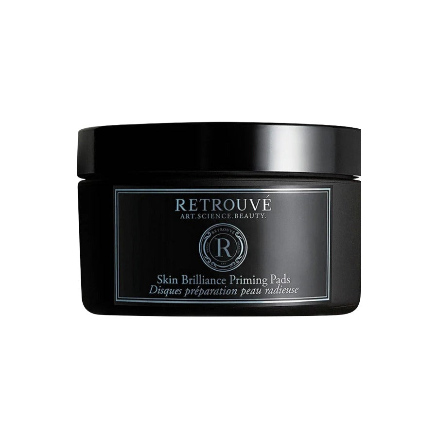 Retrouvé Skin Brilliance Priming Pads in a matte black jar with silver lid