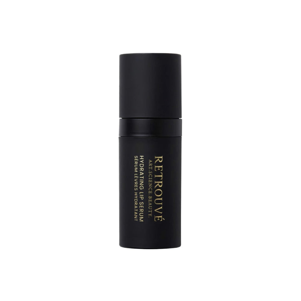 Retrouvé Hydrating Lip Serum in a sleek matte black cylindrical bottle with gold lettering
