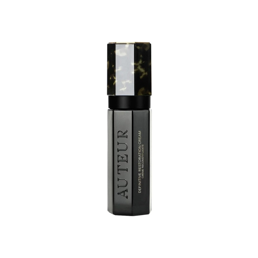 Auteur Definitive Retinol Serum in a sleek black bottle with a tortoiseshell cap