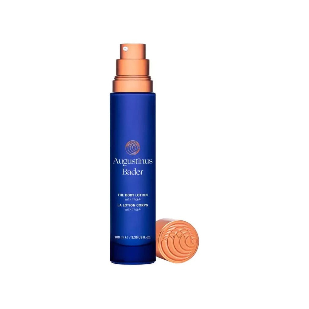 Augustinus Bader The Body Lotion 100ml pump bottle in cobalt blue with rose gold cap