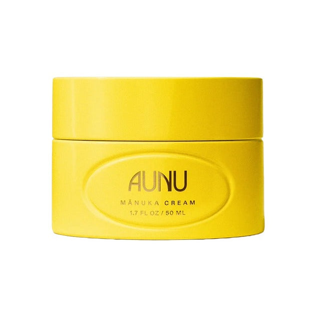 Aunu Mānuka Cream Moisturizer in a bright yellow jar, 50 ml