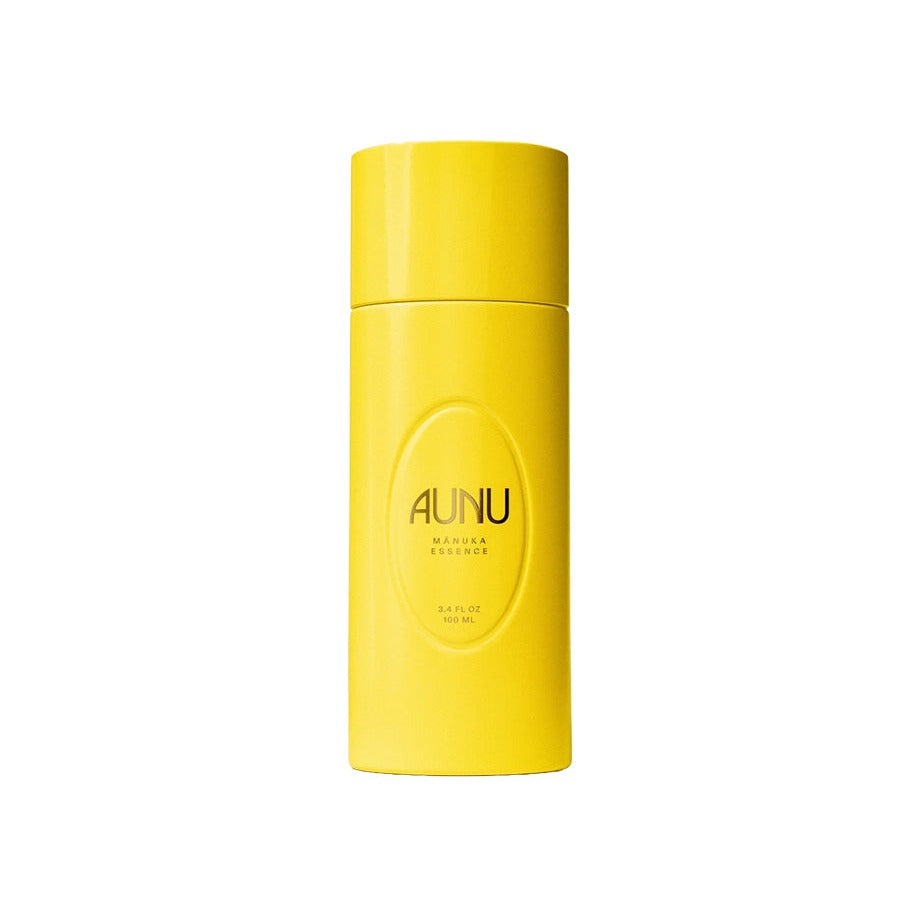 Aunu Mānuka Essence in a tall yellow cylindrical bottle, 100 ml