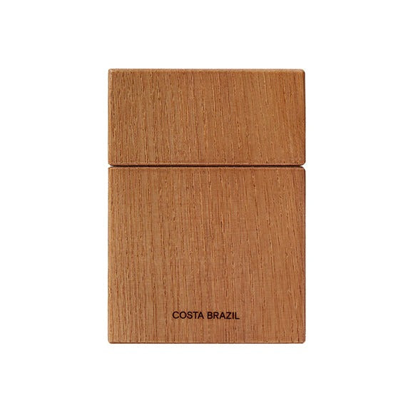 Costa Brazil Aroma Eau de Parfum in a square natural wood bottle with engraved logo