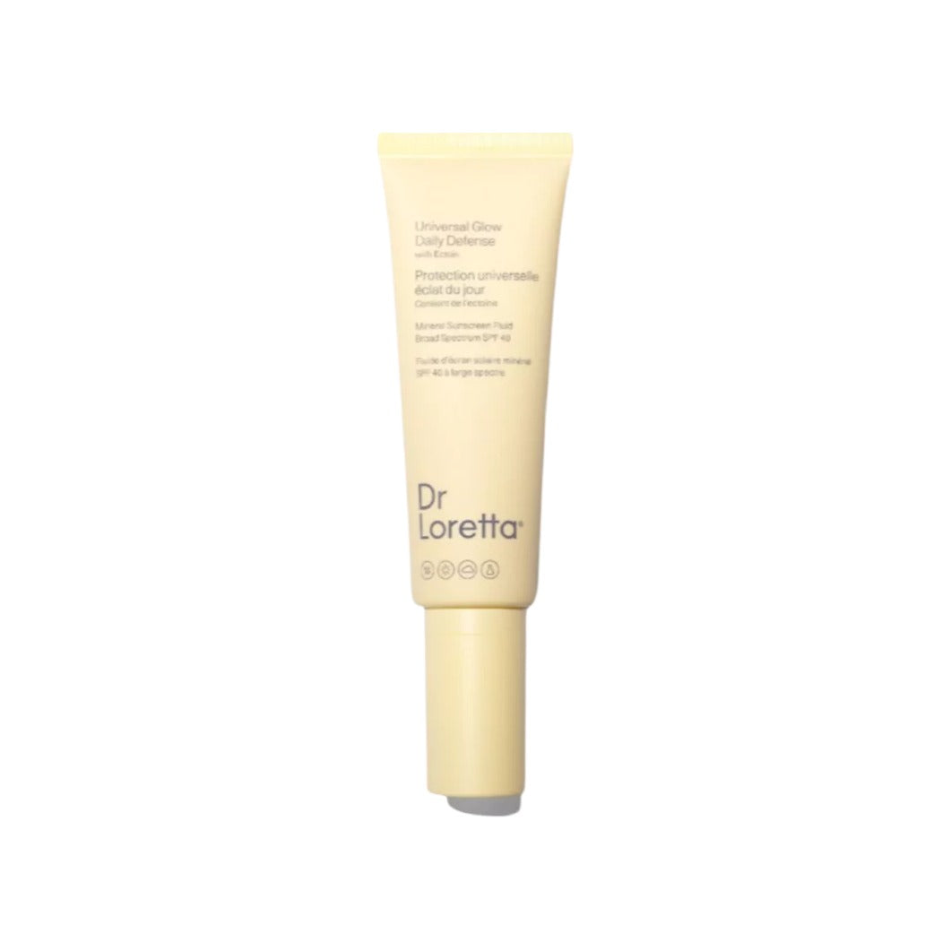 Dr. Loretta Universal Glow Daily Defense SPF 40 mineral sunscreen fluid in a soft yellow tube