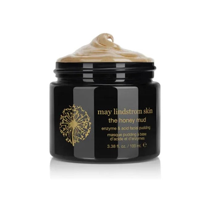 May Lindstrom Skin The Honey Mud enzyme & acid facial pudding in open 100ml black jar with golden texture swirled on top