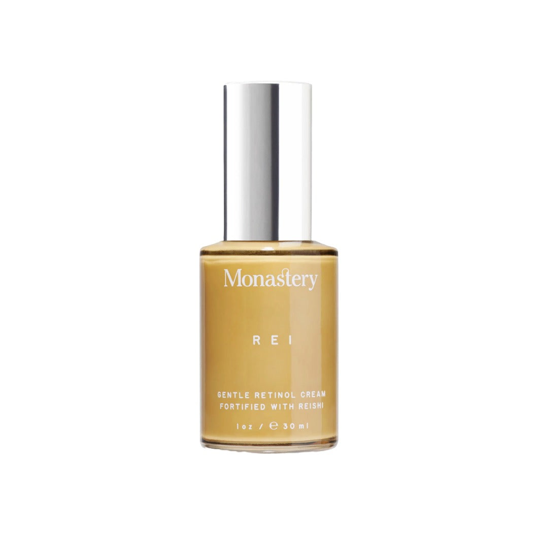 Monastery REI Gentle Retinol Cream fortified with reishi in a golden glass bottle with silver cap, 30ml