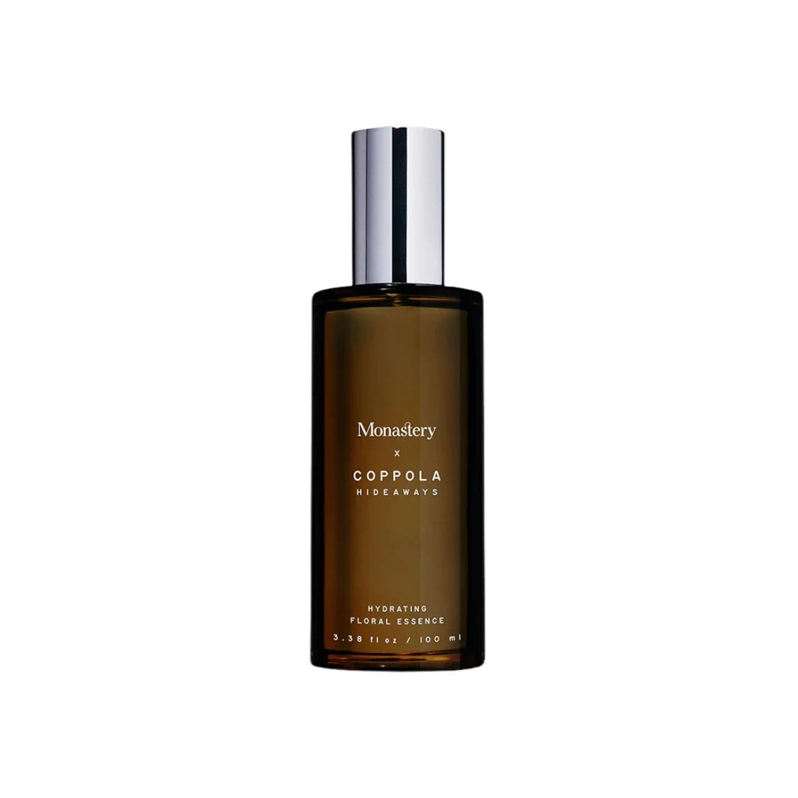 Monastery x Coppola Hideaways Hydrating Floral Essence in a dark amber glass spray bottle, 100 ml