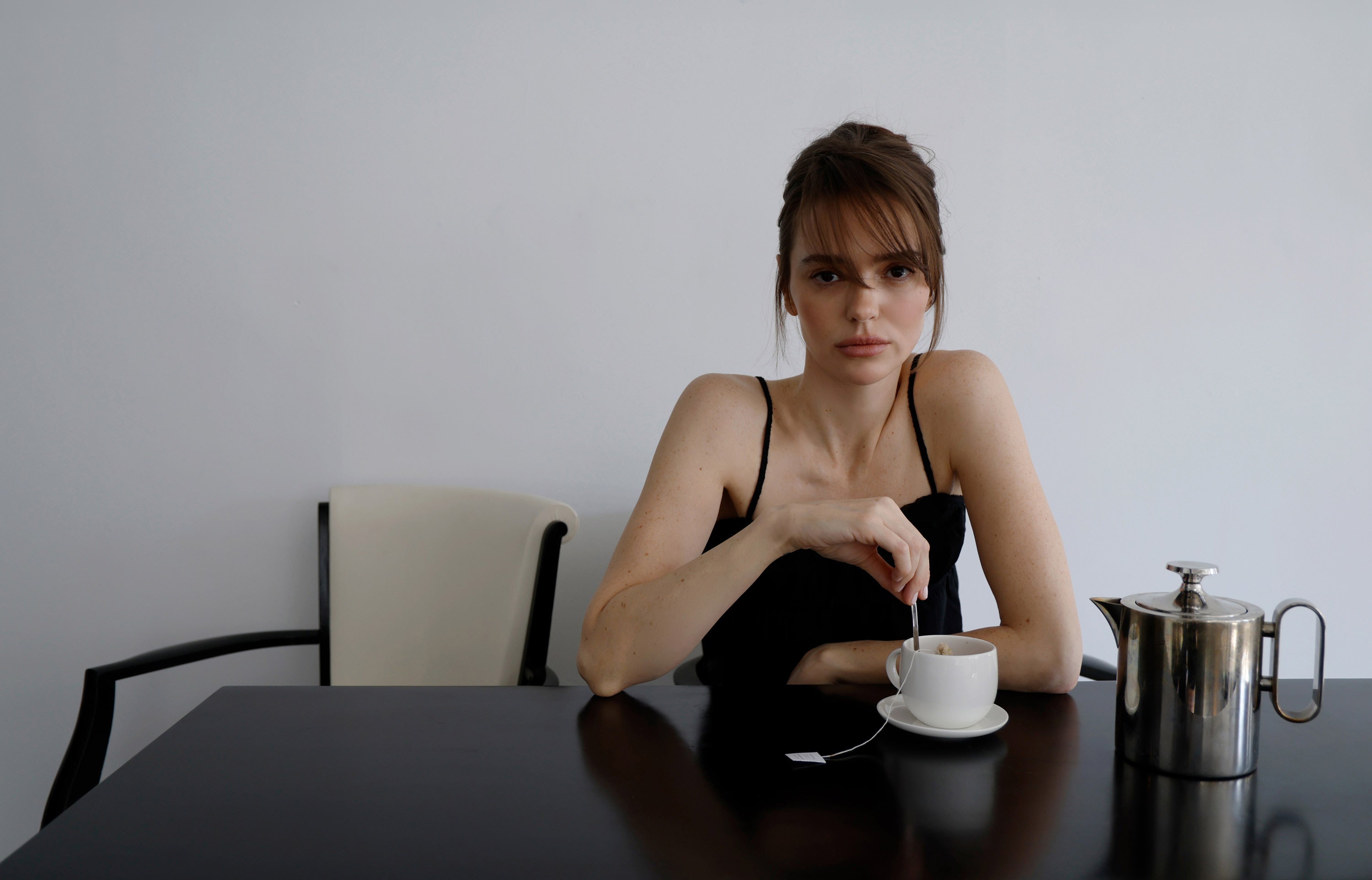 model with cup of tea — shop all