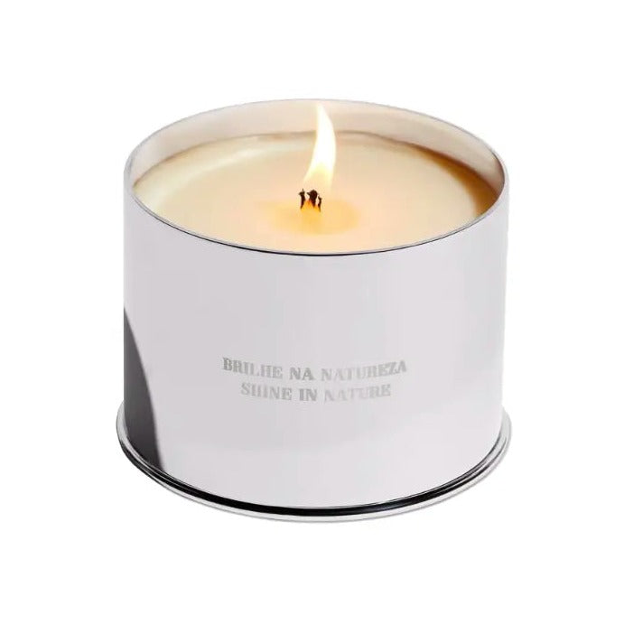 Costa Brazil Vela candle burning in a polished silver tin engraved with 'Shine in Nature'
